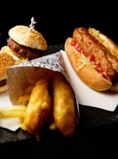 close up of burger sliders, fish fingers and mini hotdog