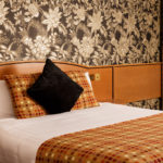 Close up of pillows on bed in privilege room