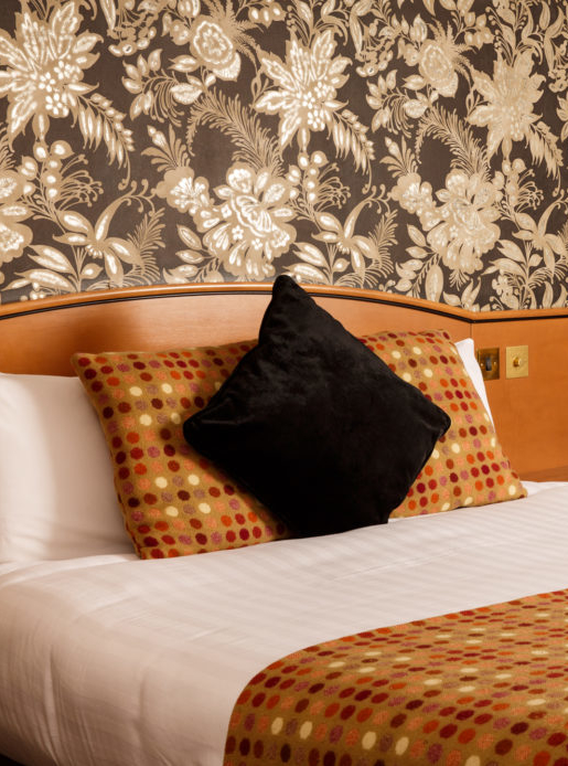 Close up of pillows on bed in privilege room